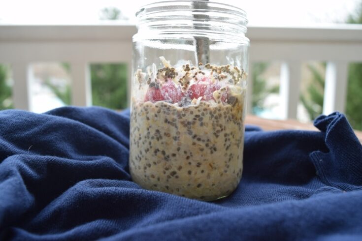 mason jar with strawberries, chia seeds and oats