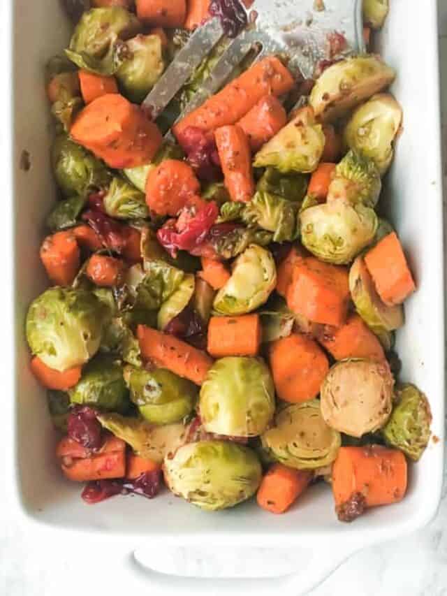 Balsamic Roasted Carrots, Brussel Sprouts and Cranberries in White Baking Dish | Bucket List Tummy