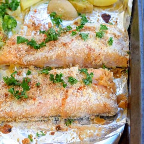 Breaded salmon on sheetpan with potatoes