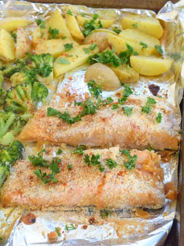 honey mustard salmon breaded and with potatoes on sheet pan