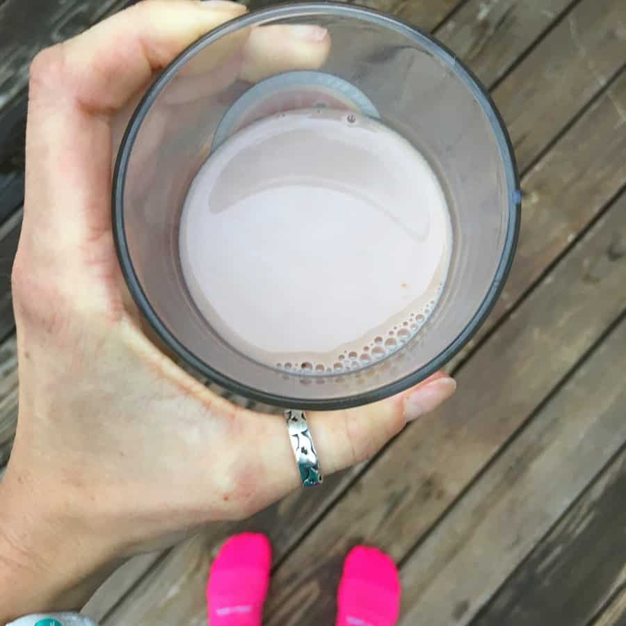 cup of chocolate milk in glass