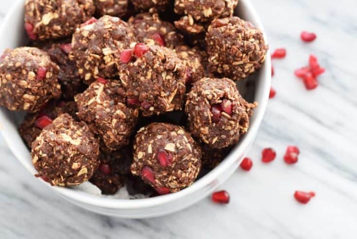 Chocolate Pomegranate Energy Bites | These Chocolate Pomegranate Healthy No-Bake Energy Balls are the perfect high-fiber on-the-go snack, naturally sweetened with dates. Not only are they full of antioxidants, but they are gluten-free and can be made vegan. 