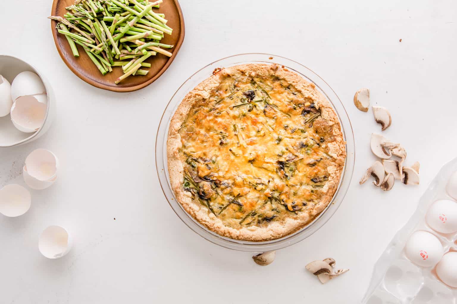 healthy veggie quiche in crust on table