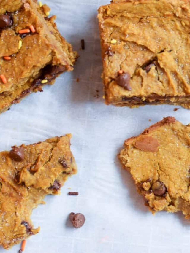 Overhead view of healthy pumpkin bars on parchment paper