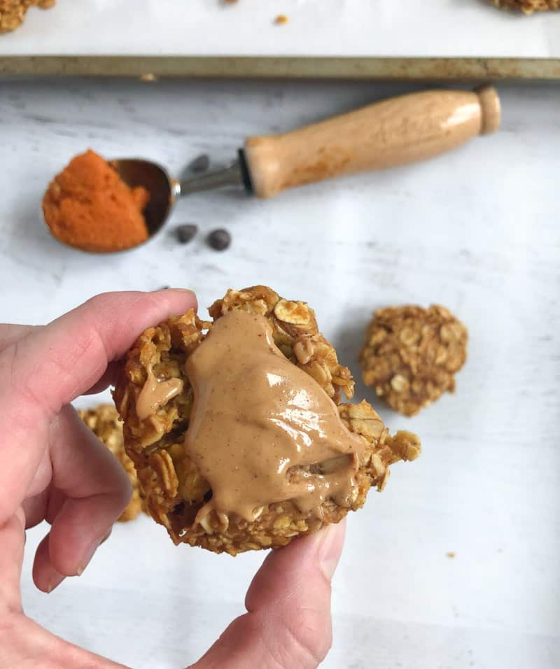 closeup of 3 ingredient oatmeal cookies topped with peanut butter