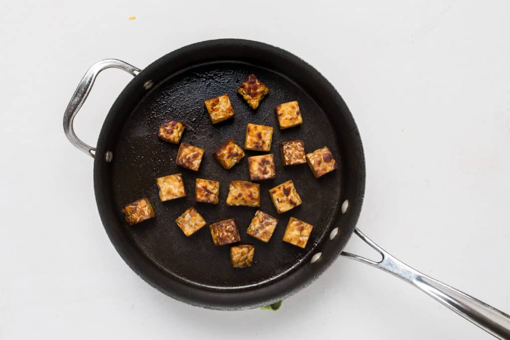 skillet with roasted and cubed tempeh