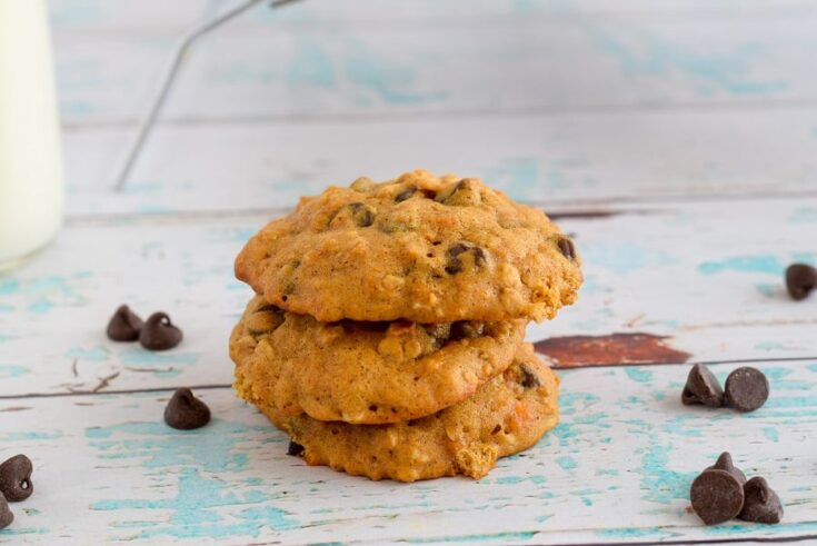 stack of sweet potato breakfast cookies with chocolate chips on blue wooden board