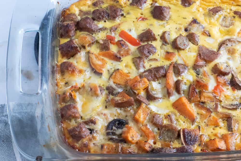closeup of turkey sausage breakfast casserole cooked in clear baking pan
