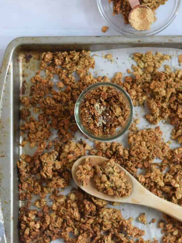 Baking sheet with wooden spoon and protein granola recipe