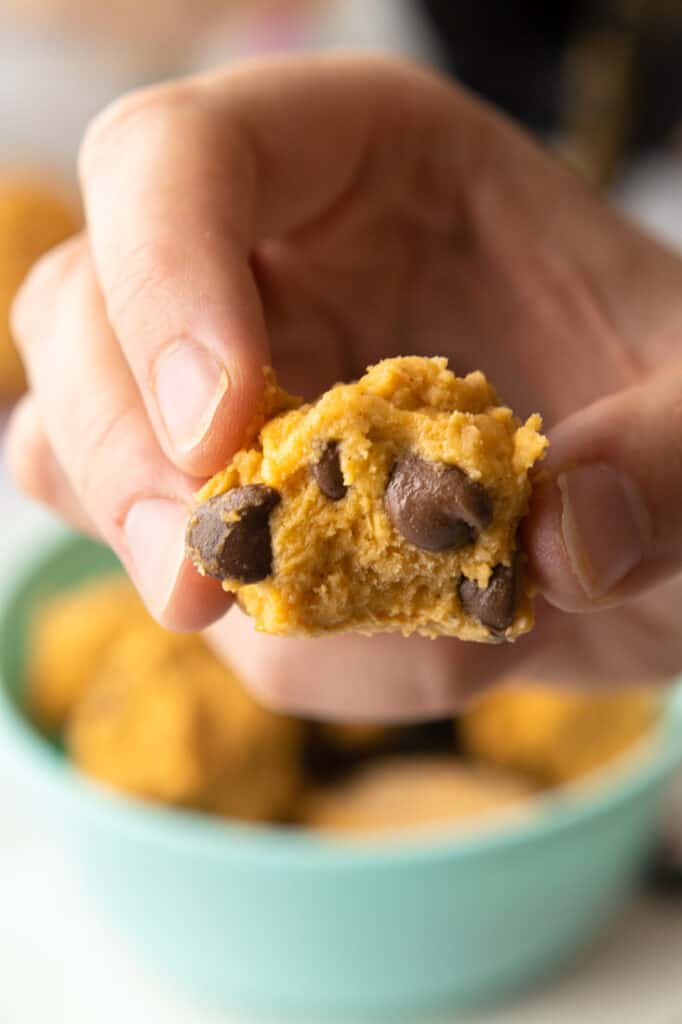 no bake cookie dough bite with chocolate chips with bite taken out