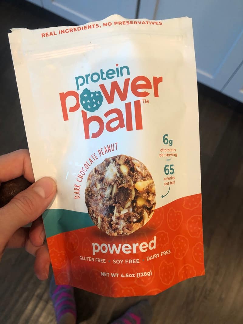 hand holding protein power ball pack