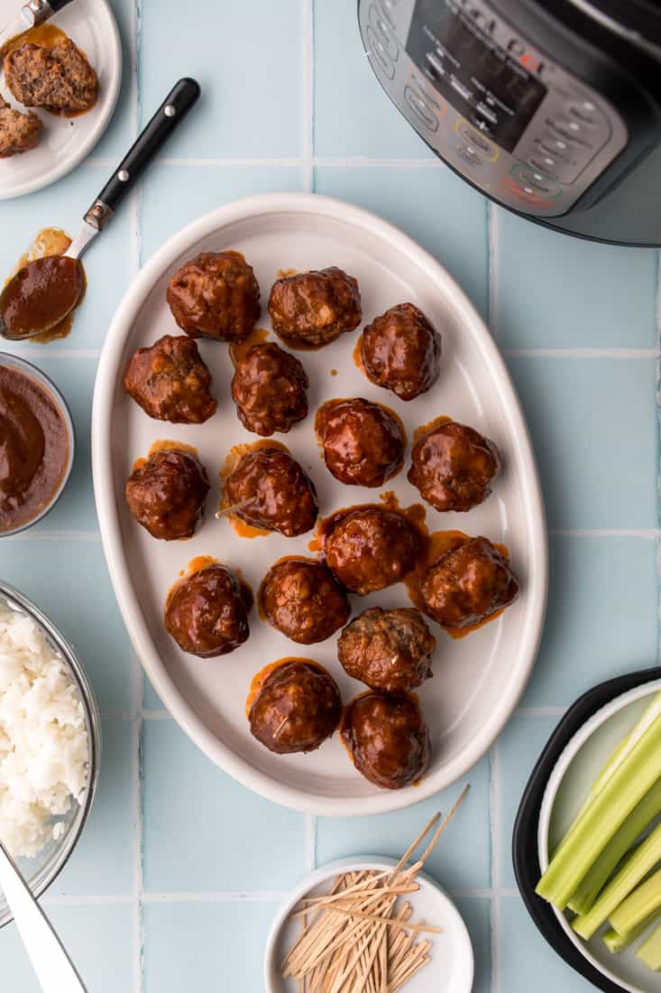 Bison meatballs in BBQ sauce on white plate