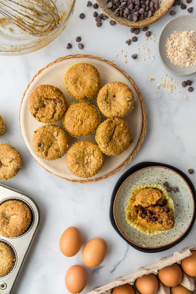 plate with 7 almond flour muffins and ingredients around