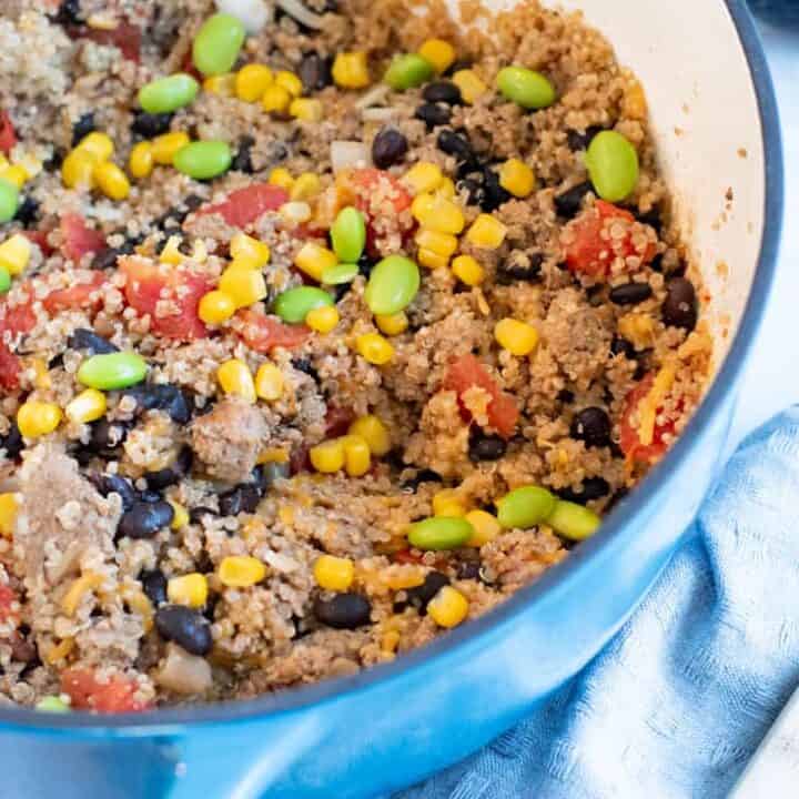 ground turkey quinoa casserole cooked in blue baking dish
