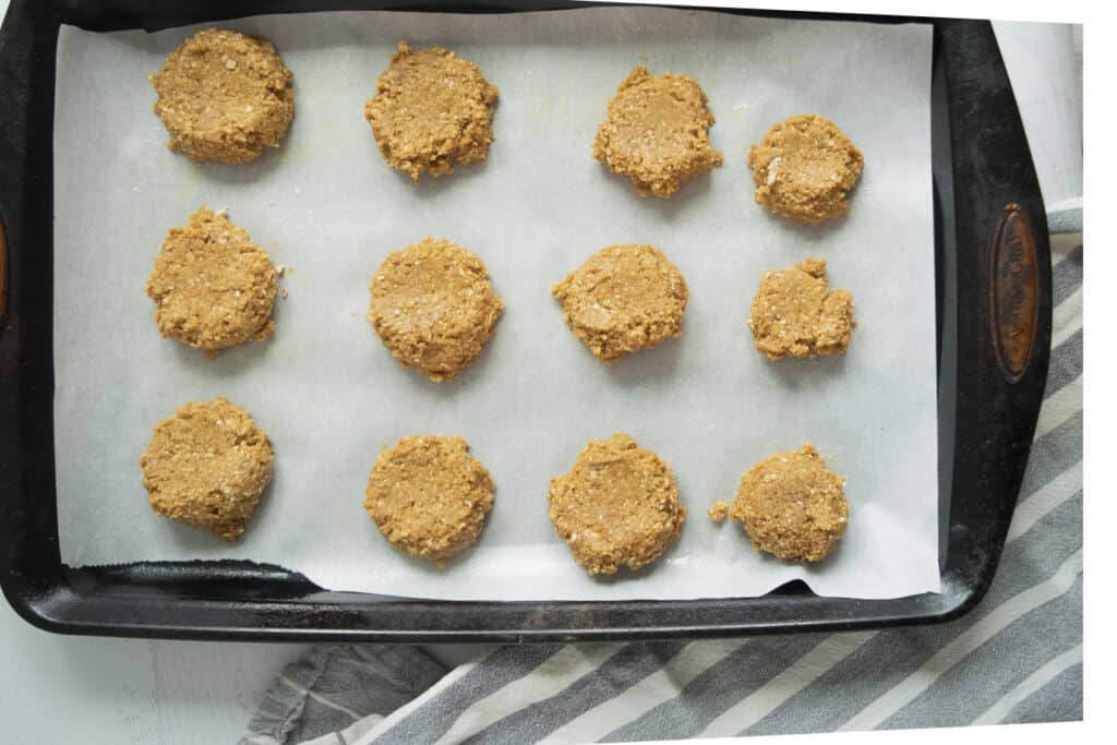 pb2 cookies on baking sheet with parchment paper before baking