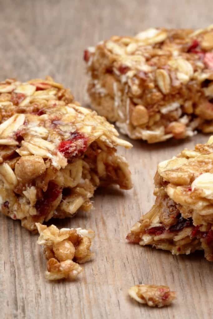 granola bars with berries on countertop