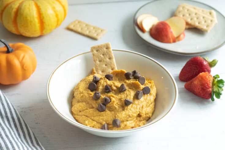 pumpkin cookie dough with chocolate chips in white bowl