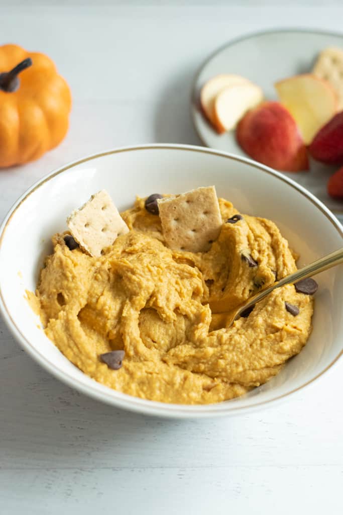 edible cookie dough with pumpkin in white bowl