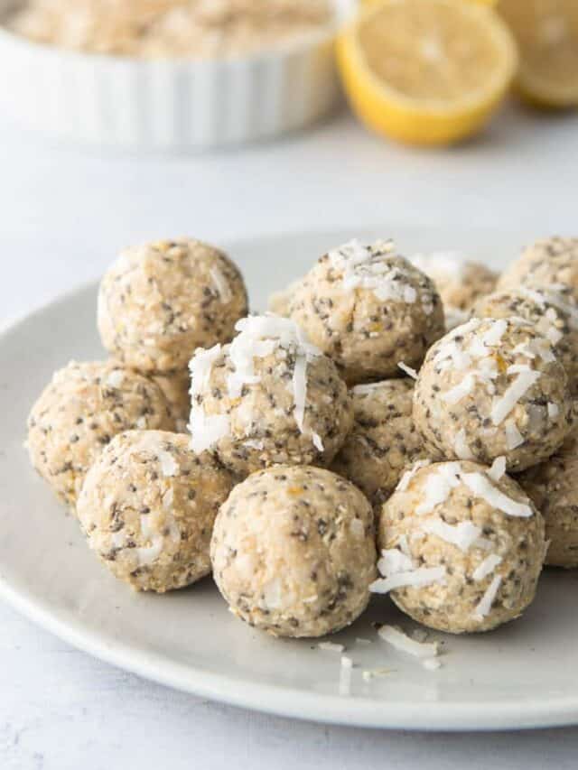 lemon protein balls on plate wrapped in coconut