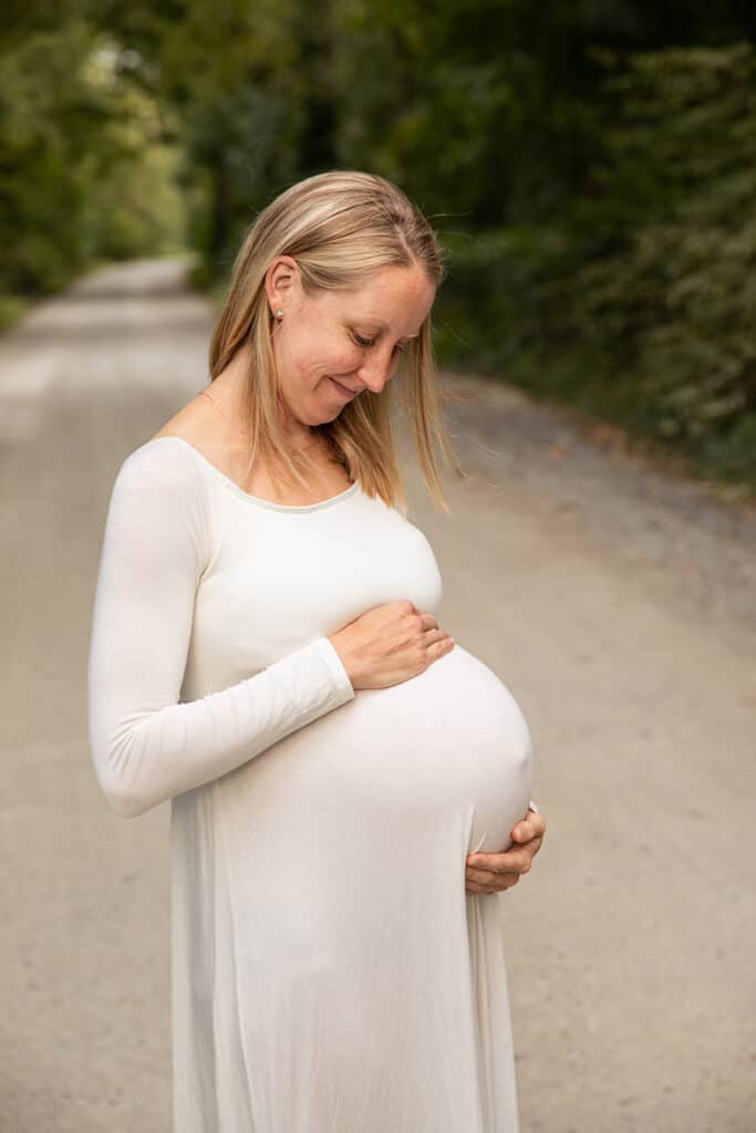 pregnancy maternity photos in white dress