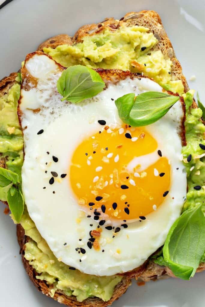 soft boiled egg on toast with avocado