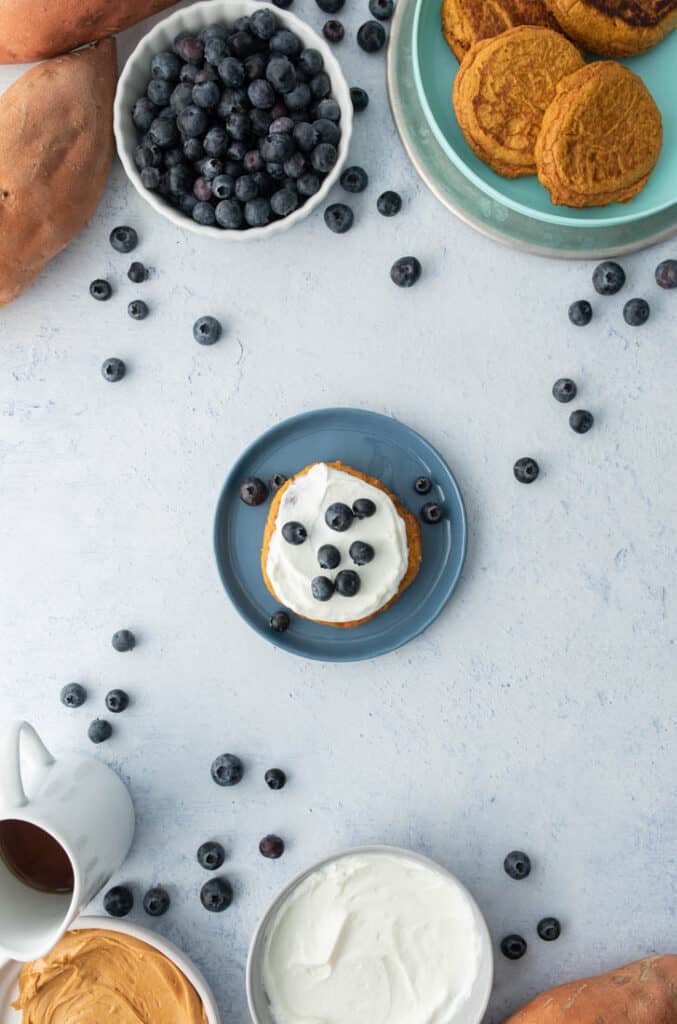 sweet potato baby pancakes with yogurt and blueberries