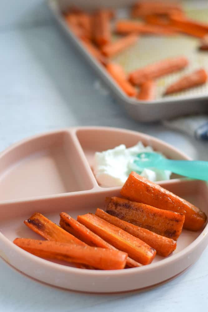baby led weaning carrot sticks on plate for baby