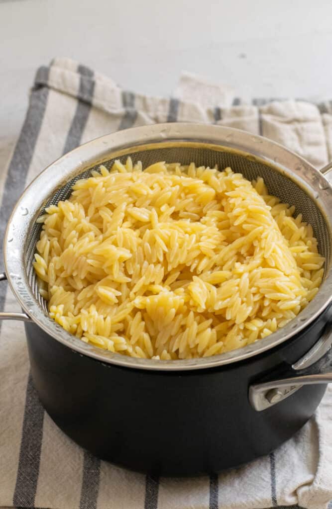 pan with cooked orzo in it
