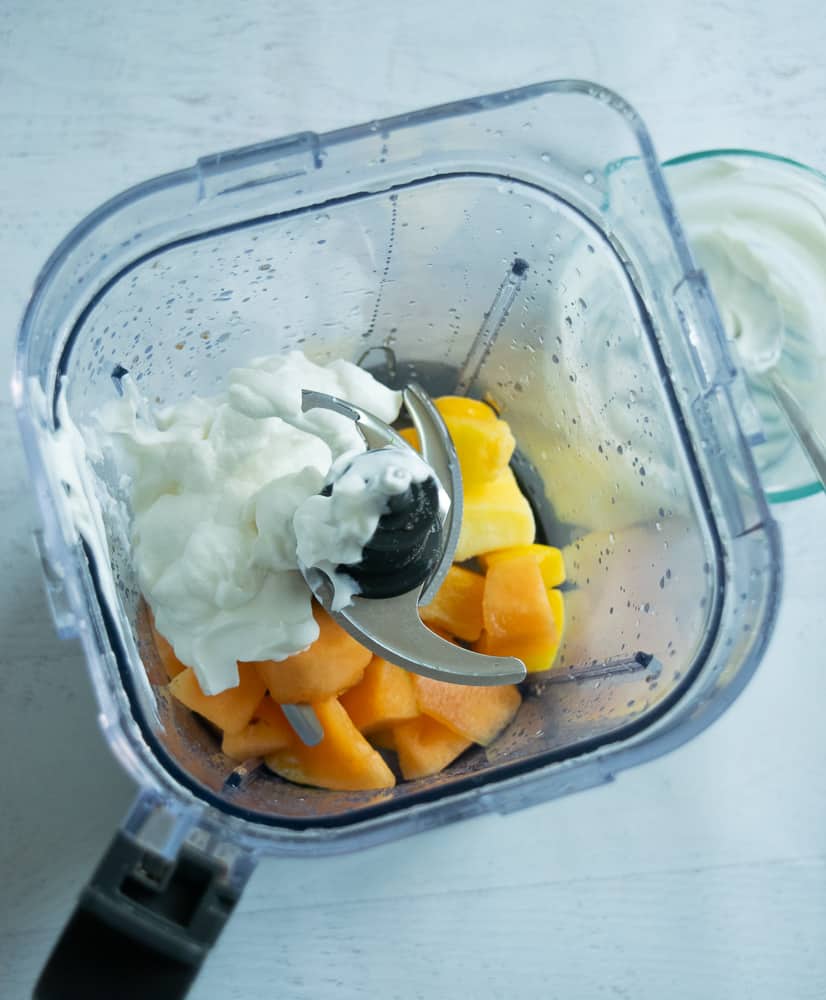 yogurt, mango and cantaloupe in smoothie