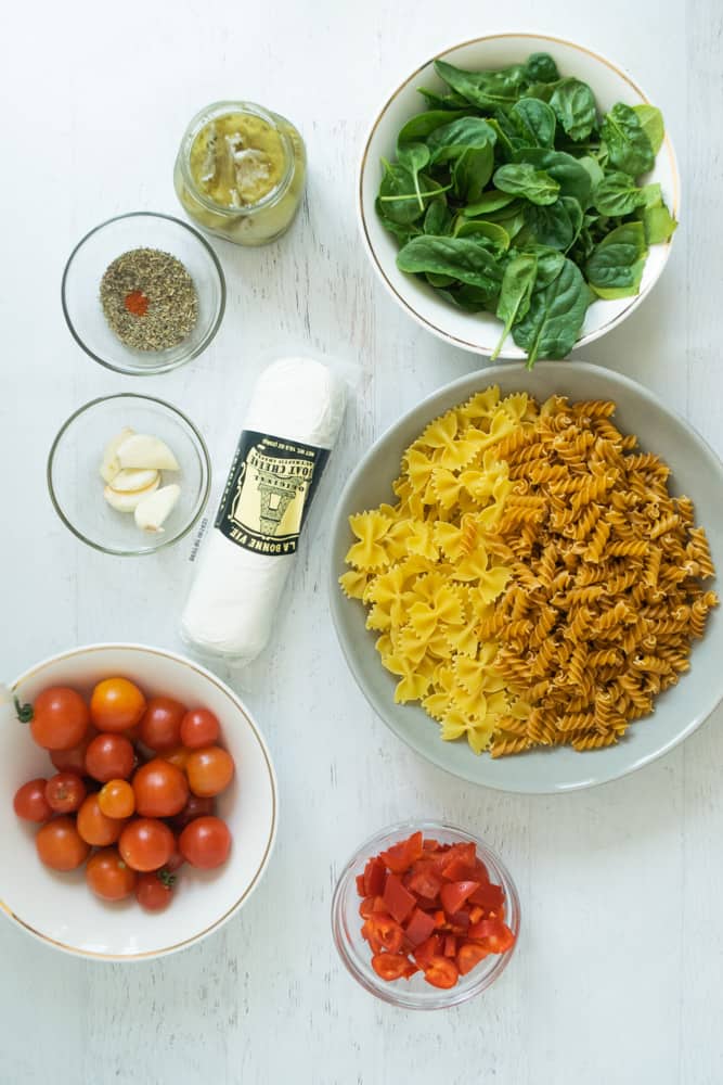 ingredients laid on table for goat cheese pasta
