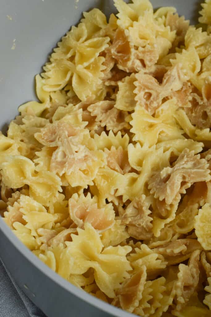 cooked farfelle pasta in pot