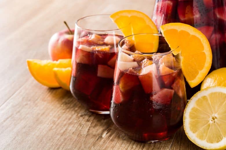 sangria with fruit slices and oranges