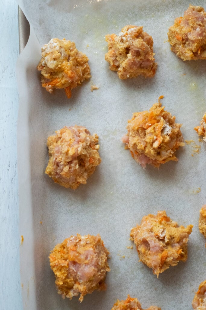 chicken meatballs for baby on baking sheet