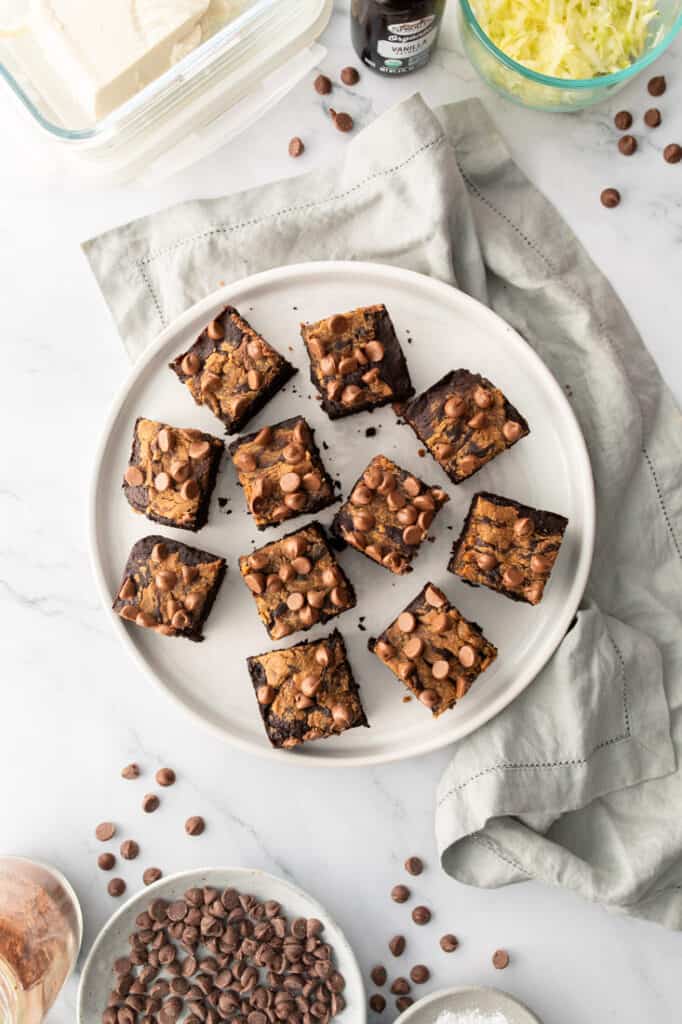 silken tofu brownies with peanut butter frosting on white plate
