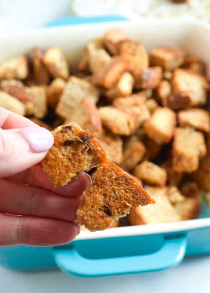 blue baking dish with whole wheat croutons