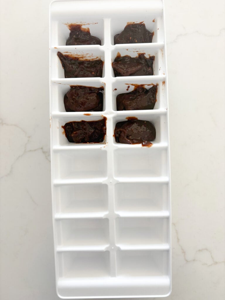 ice cube tray with frozen prune puree