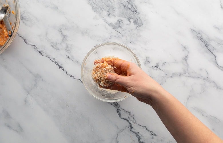 measuring out batter for sweetpotato chicken nuggets