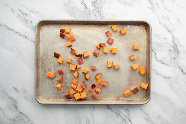 diced sweetpotatoes on baking sheet