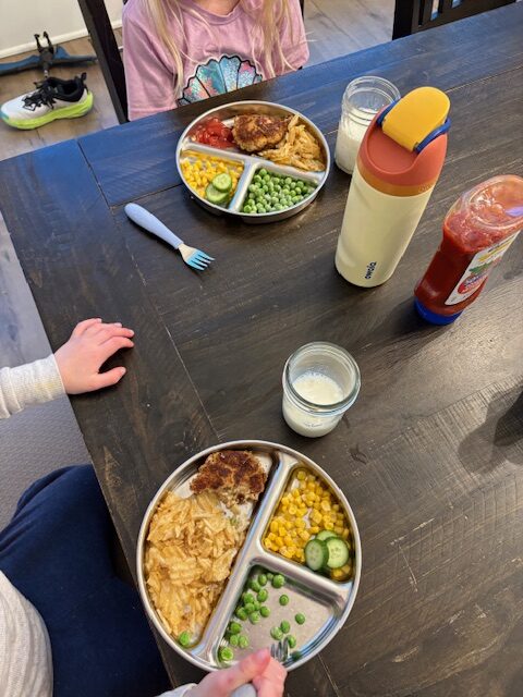 dinner table with kids plate serving meals family style