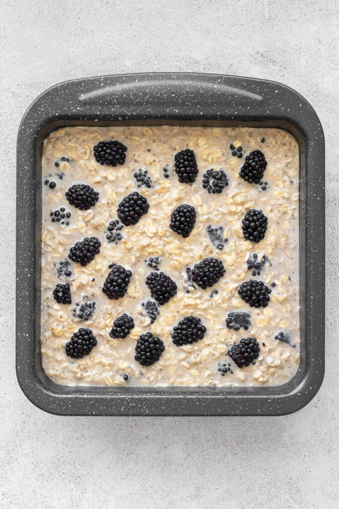 blackberry baked oatmeal in 8x8 baking pan before baking