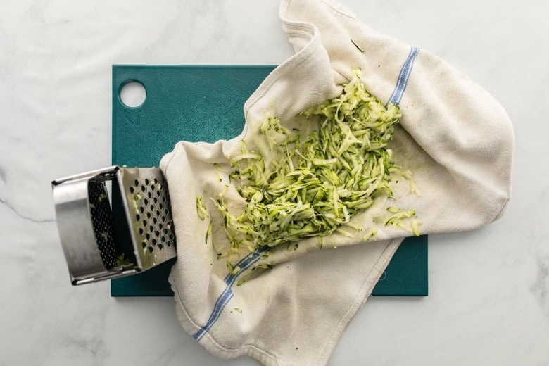 shredded zucchini on cloth
