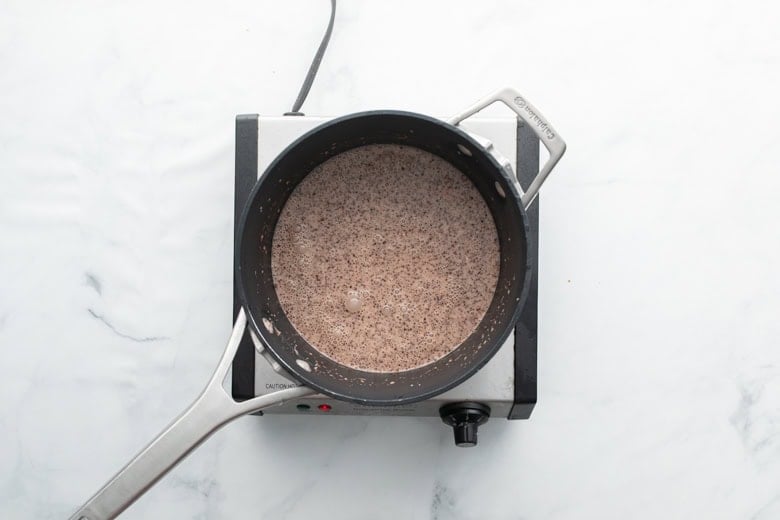 ingredients for chocolate popsicles over medium-high heat.