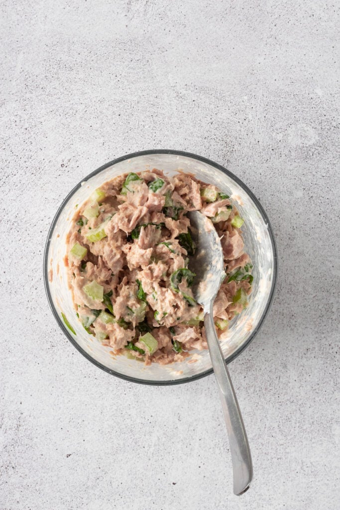 bowl with mayo, veggies, spices and tuna for tuna quesadillas