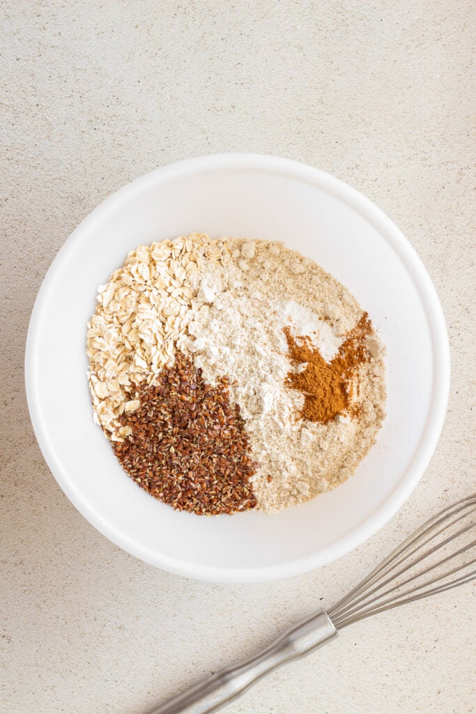 white bowl with dry ingredients for banana oat chocolate chip bars
