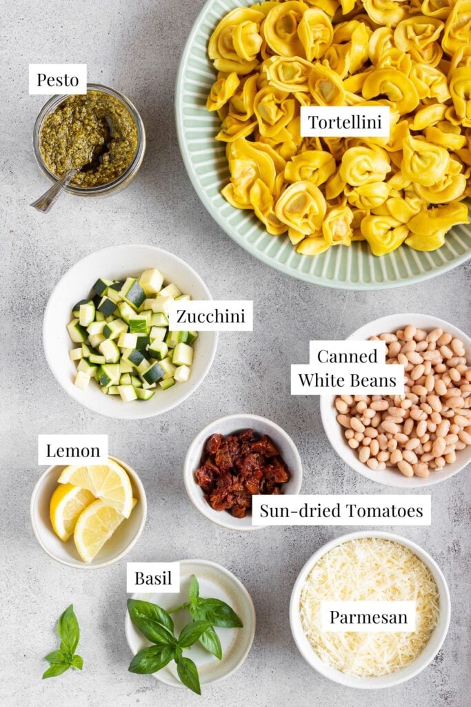 labeled ingredients for pesto tortellini pasta salad