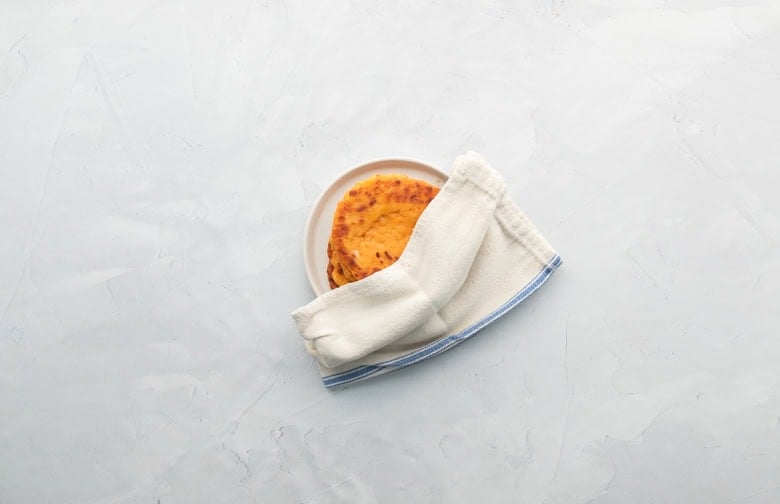 cooked sweetpotato flatbreads in glass bowl